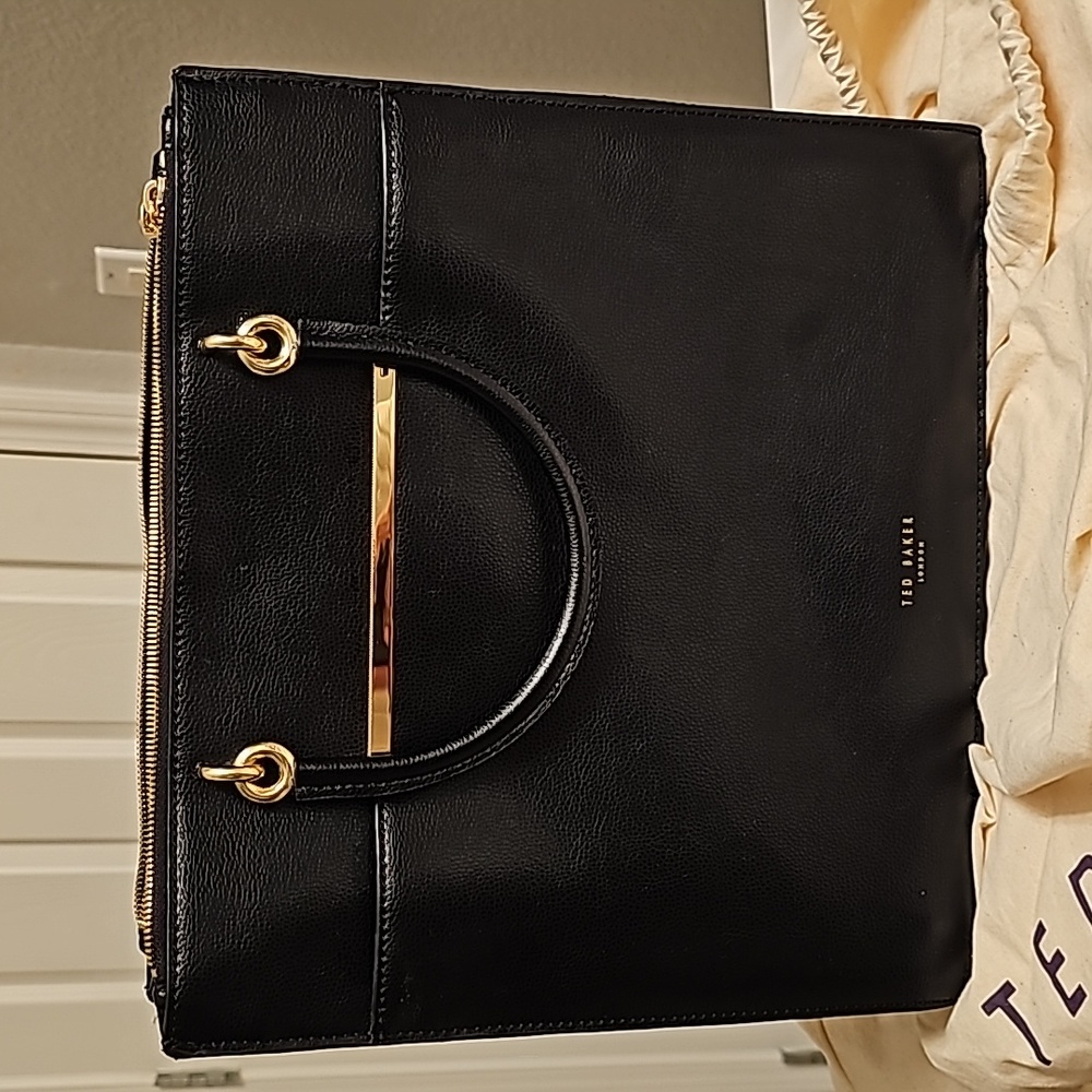 TED BAKER LONDON Black and Gold bag with straps and 3 compartments.
